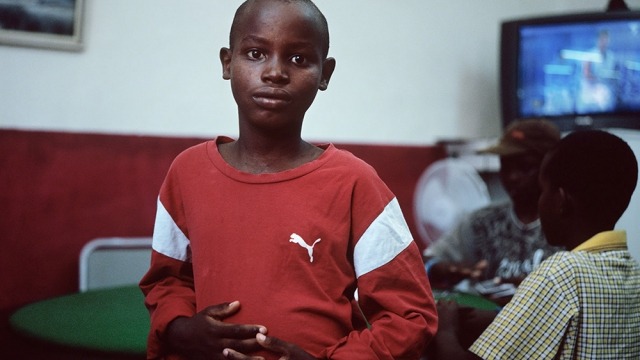 PORTSIDE Image: Tom Williams ‘Congolese boys recently emigrated as refugees. Turkish café, Cringila 2010’ from the series Wollongong Now