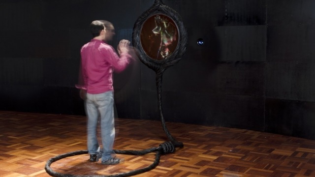 Jay Kochel / Simon Scheuerle Jay Kochel Smoking Mirror, 2012 hair, bitumen, polyurethane, polyester resin, timber, webcam, code, computer dimensions variable