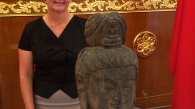 Dr Charlotte Galloway with the sculpture of Guanyin
