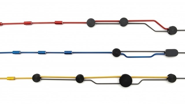 Necklaces by Phoebe Porter from her Transit Series, in red, blue and yellow.