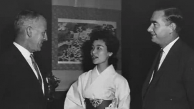 Image: Miss Reiko Nakamura - "Miss Wool Japan" - paid a brief visit to Canberra on 6-7 March, during a 20-day tour of Australia as part of her prize for winning the "Miss Wool Japan" title. During her stay in Canberra, Miss Nakamura was the guest of honour at a reception, given by the Japanese Ambassador to Australia, Mr Saburo Ohta. She is shown here with the Deputy Secretary of the Department of Trade, Mr A.R. Carmody (left) and the Secretary of the Department of Primary Industry, Mr A.C.B. Maiden, at the